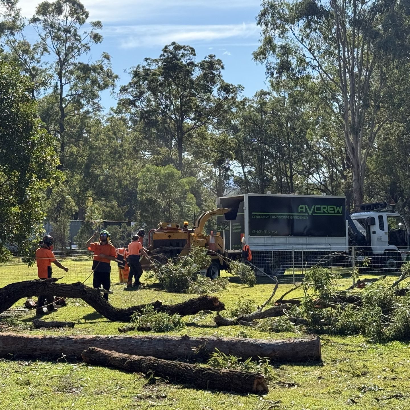 Crew and truck clearing a block